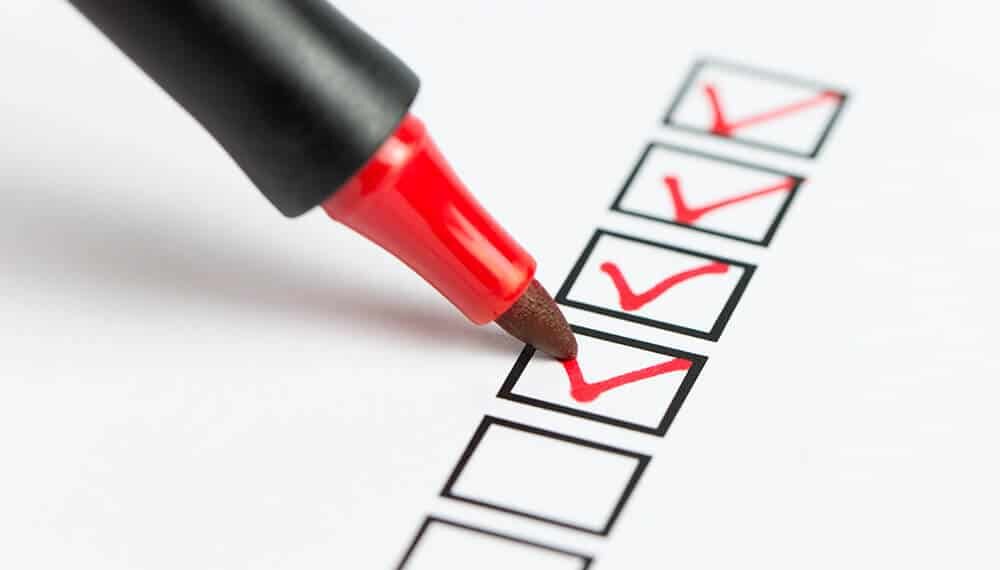 Checklist marked red with a red pen